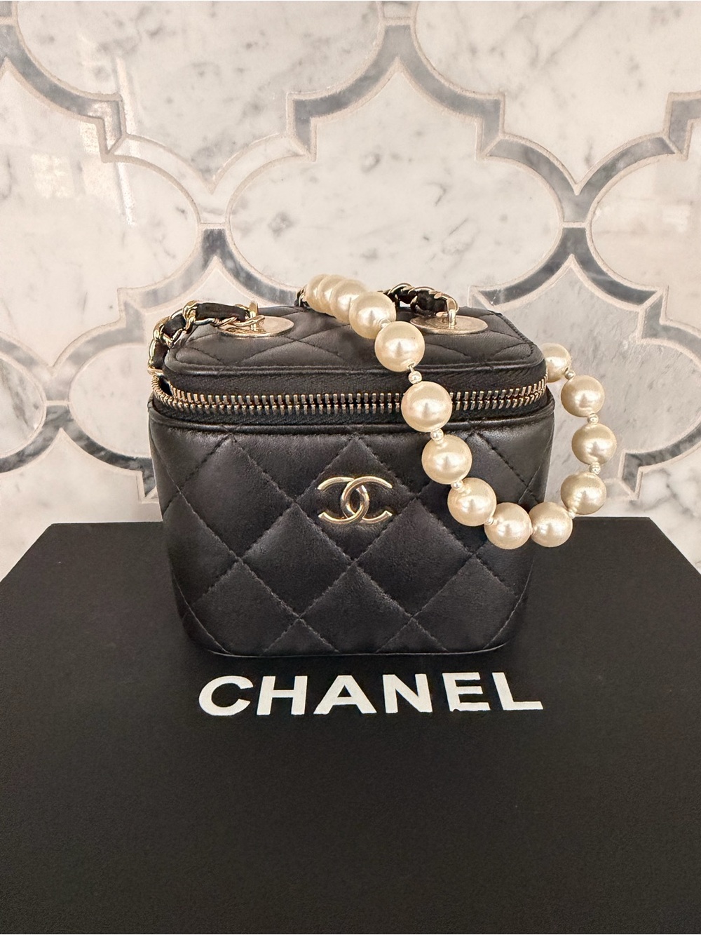 CHANEL Black Quilted Vanity Mini Bag with Pearl Strap